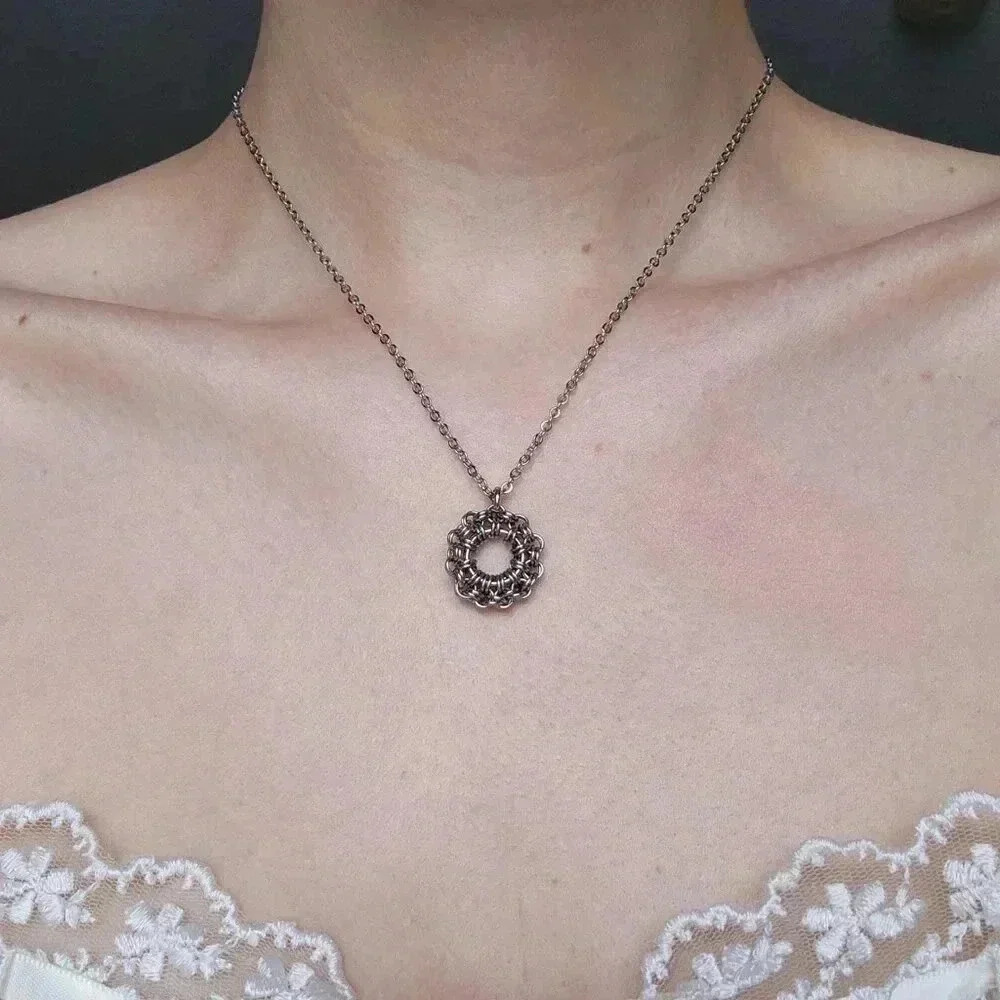 Classic silver circle necklace with a small silver chain